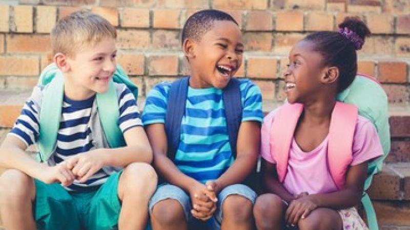 Kids Laughing outside of School